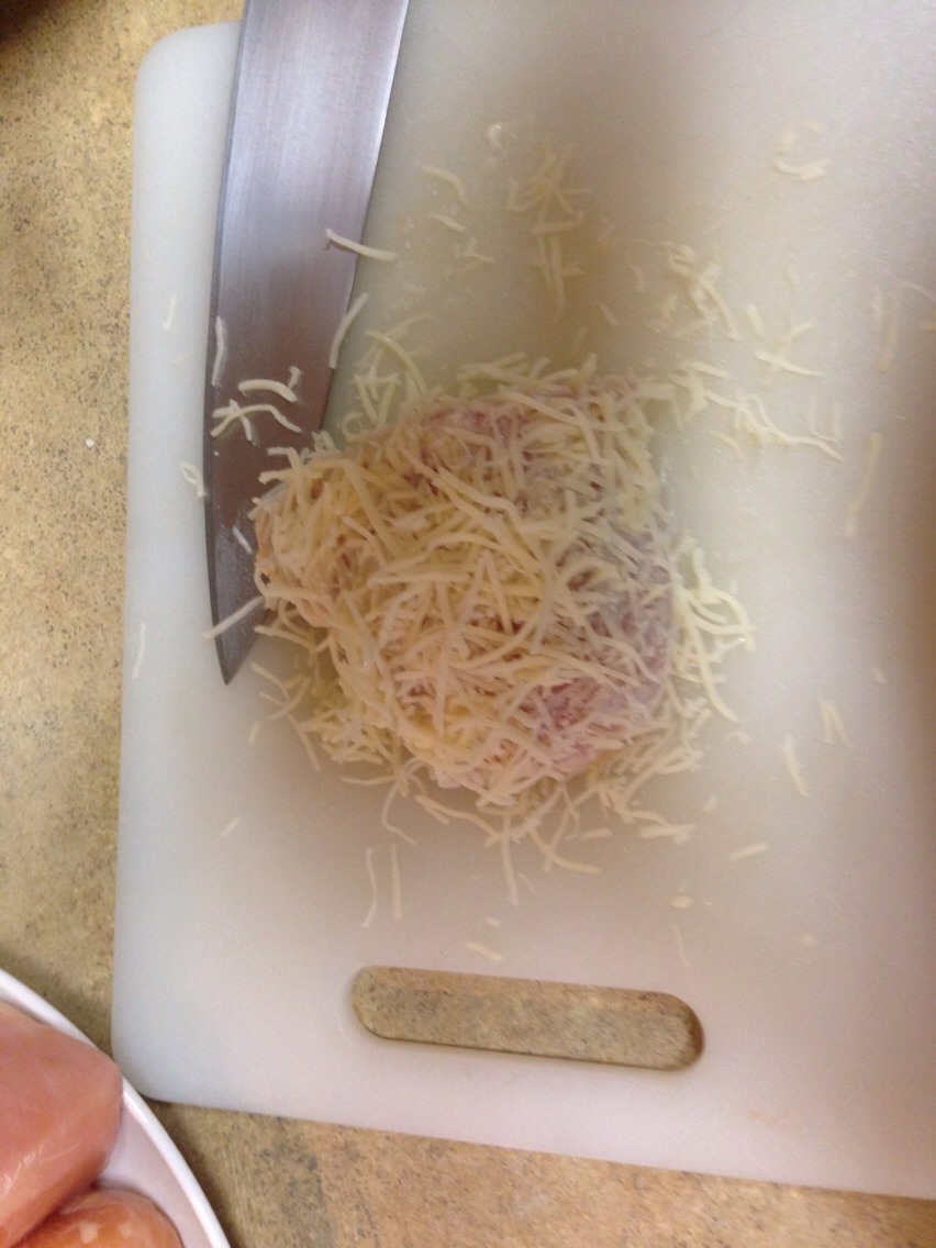 Then add your breadcrumbs and shredded cheese. Both sides too!