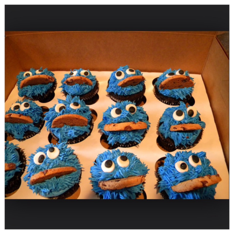 These cupcakes are great for a child's birthday party! Bake the cupcake and get blue frosting. Get the special tip (which can be found at almost any store) and frost. Then get googly eyes and stick them on. After cut a cookie in half and stick it below the eyes