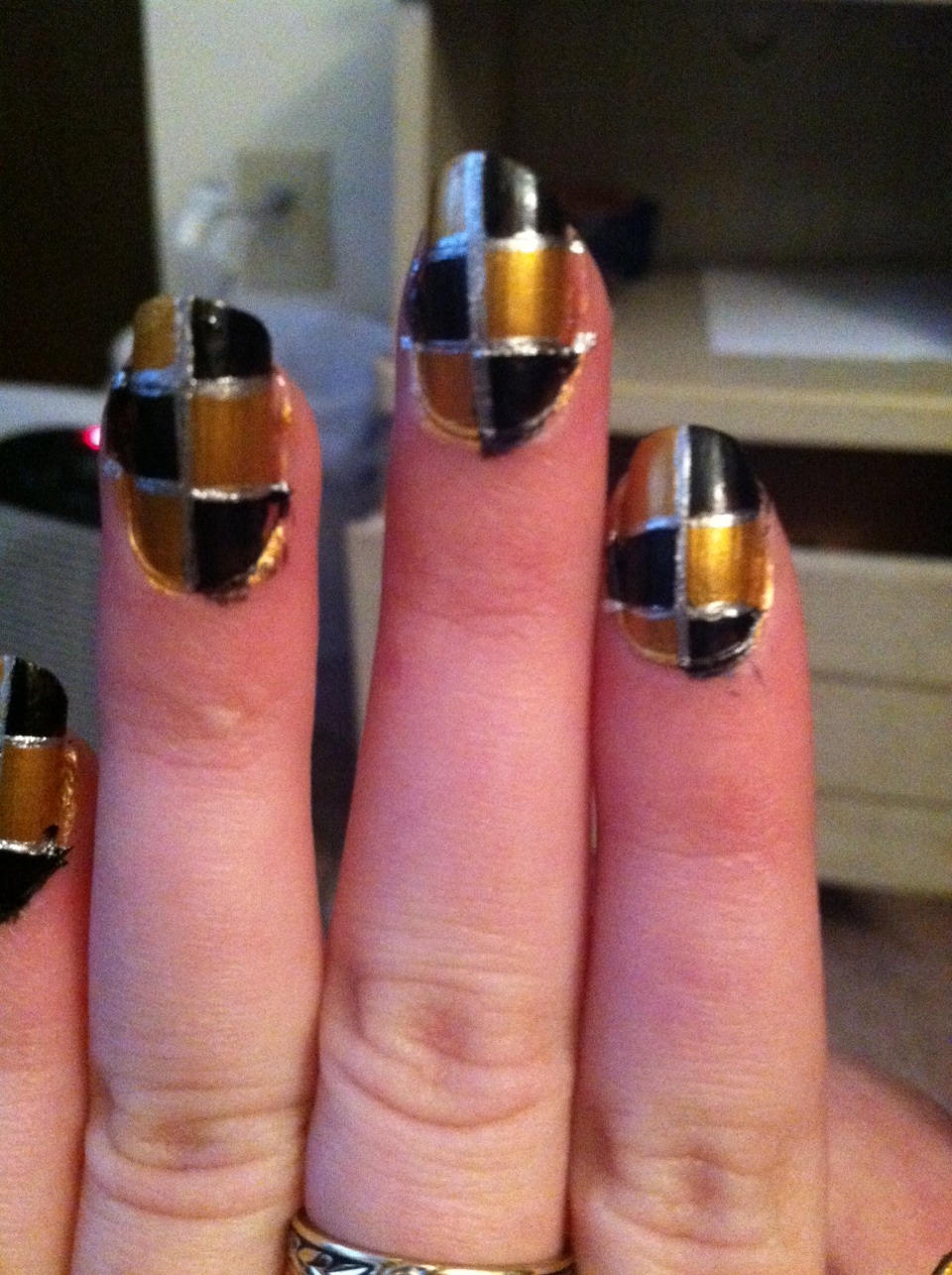 To add extra take a slim nail art brush and make lines in between  the colors