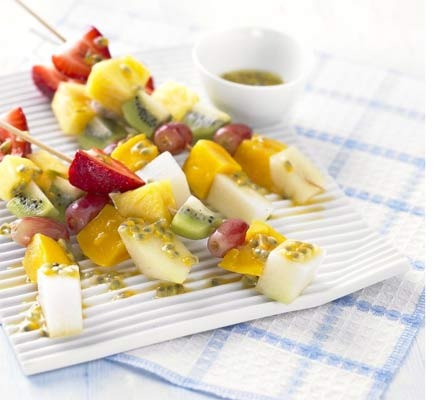 Frozen fruit sticks with passionfruit& lime drizzle.