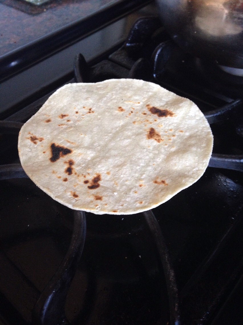 Warm up some tortillas while the eggs are cooking 🍳