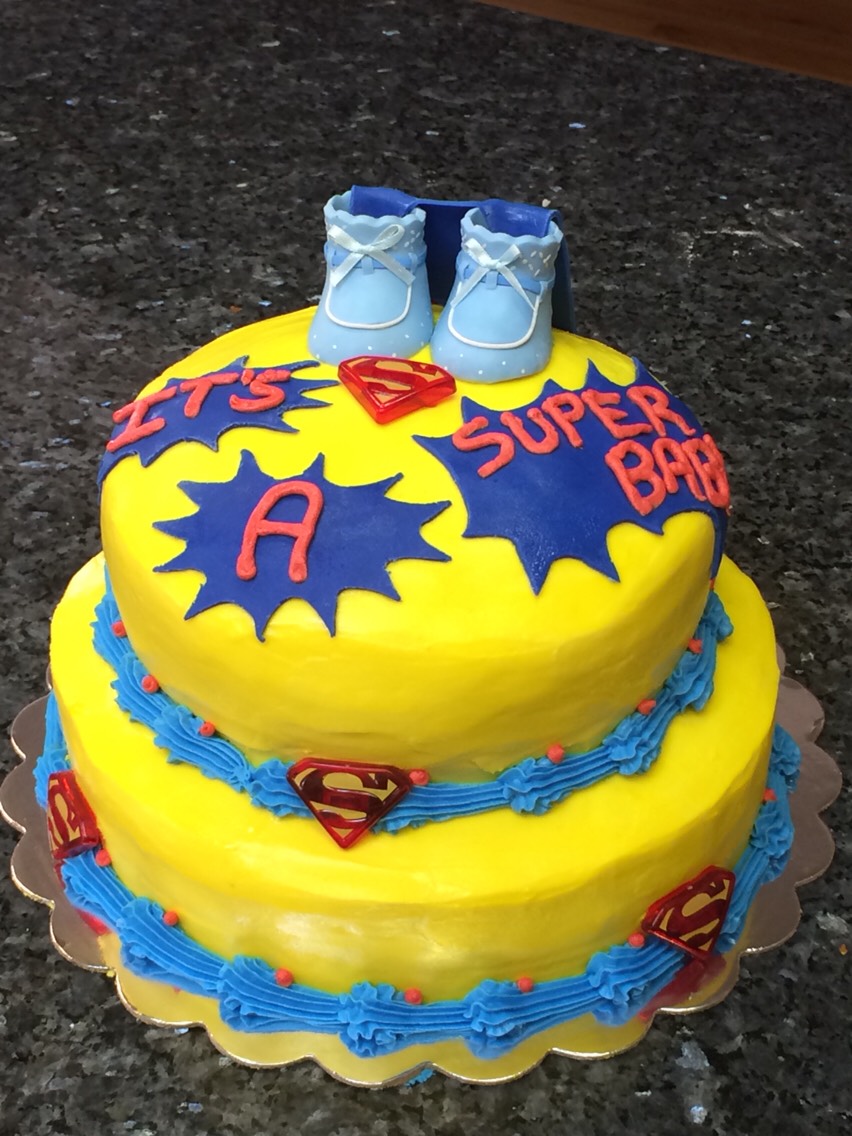 The next day smooth your cake with buttercream, cream cheese or whipped frosting and pipe your borders on. Then, add your pre-prepared fondant decorations along with any other decorations, do any writing you need, and your done.