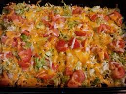 Ingredients:
1 pound ground beef or ground turkey
8 oz bag of shredded cheddar cheese
8 oz bag shredded mozzarella cheese
Tomato (chopped)
9 oz bag of Nacho cheese Doritos
Bag of shredded lettuce
pack of Taco seasoning
sour cream(optional)
Taco sauce (optional)
9 X13 in casserole dish