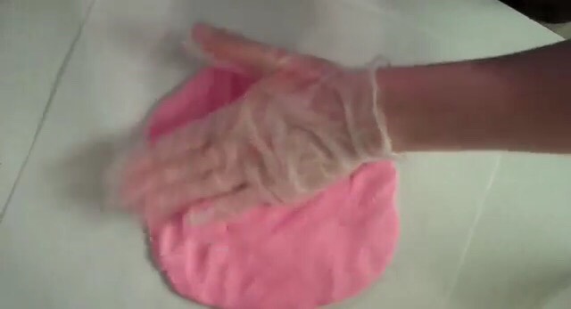 •Mash it up into a dough. 
•Flatten the first color out ontop of wax paper
