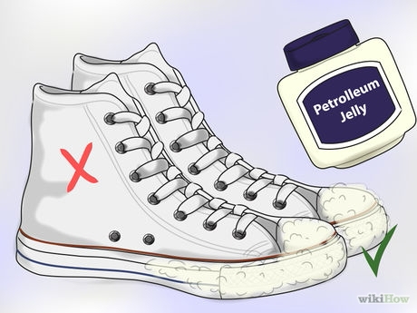 Petroleum jelly can cling to the dirty particles of scuffed up material and lift away the debris.
Keep the petroleum jelly on the rubber portion of the shoe and avoid the canvas part, if possible. The oil in petroleum jelly can sometimes leave a light stain of its own on fabric