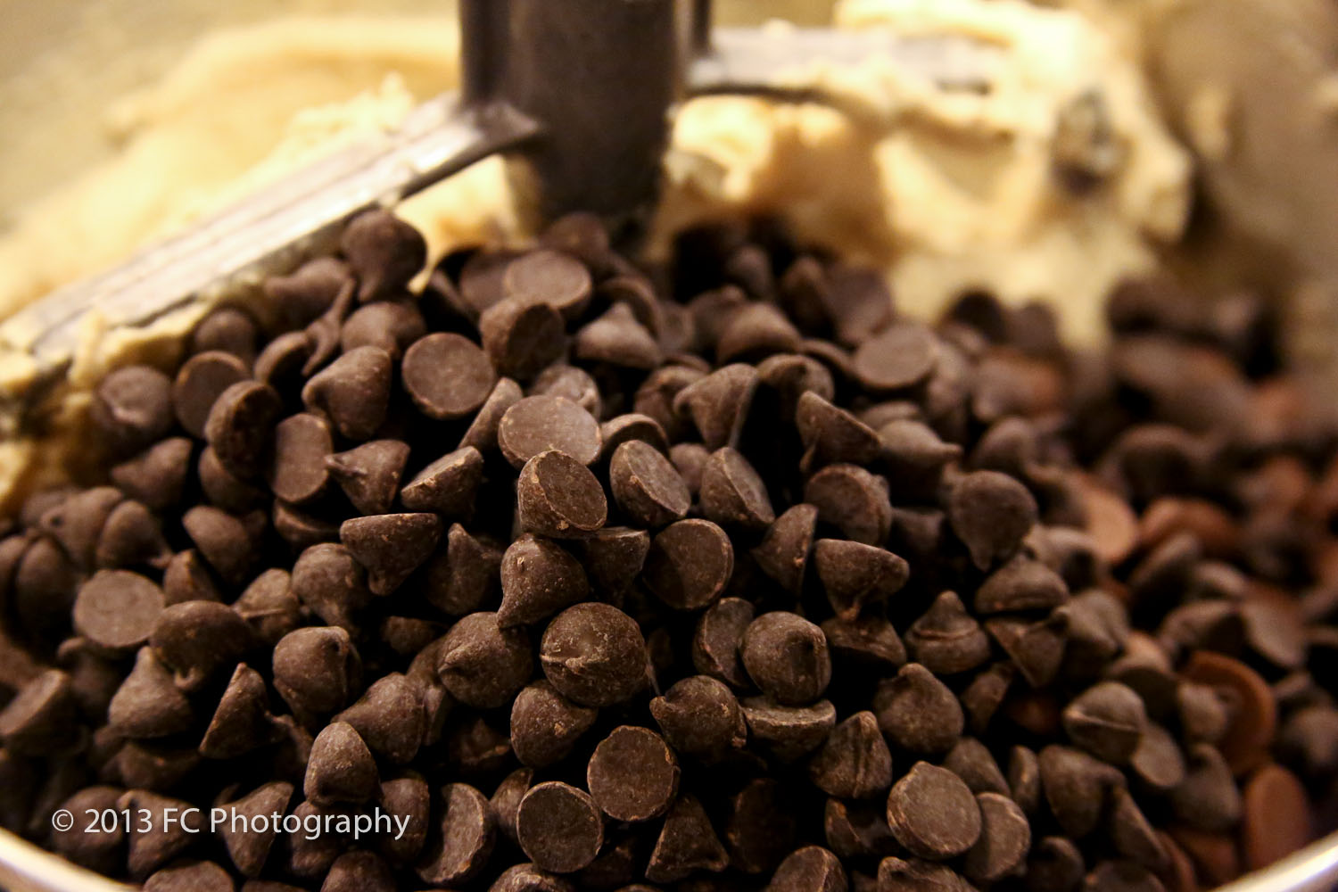 mix in your chocolate chips if this gets to hard put in a sauce pan on low heat  but be careful not to melt the chocolate chips
