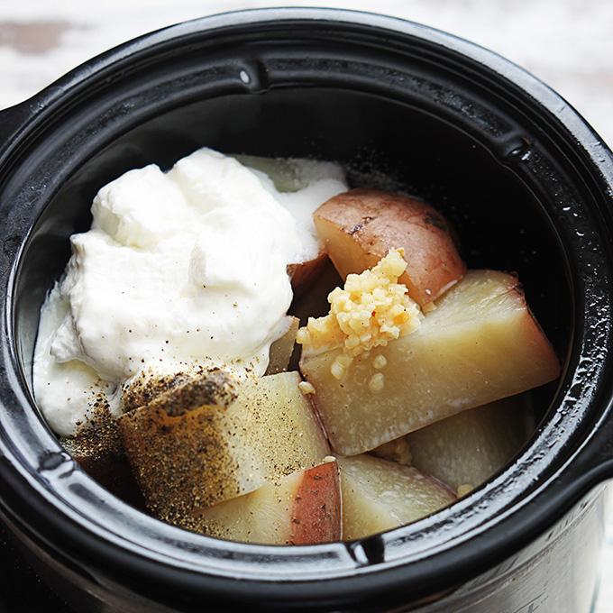All you have to do is cut up your potatoes – you don’t even have to peel them if you don’t want to – and then let them cook for a few hours. When they’re done, you come back, dump the last few ingredients in, and whip those babies up in a matter of about 1 minute. 