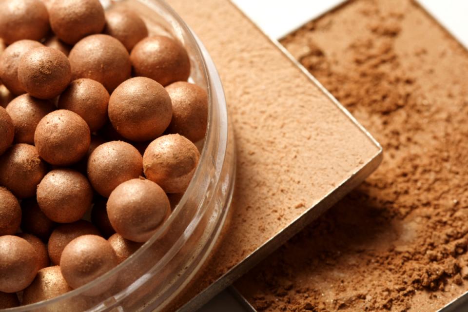 Apply Bronzer Evenly
Before applying bronzer or self-tanning lotion, mix a drop or two of the solution with moisture cream. Blend using your finger or a Q-tip then apply to skin as you would regular moisturizer. This will ensure the cream blends in — and covers skin — evenly.