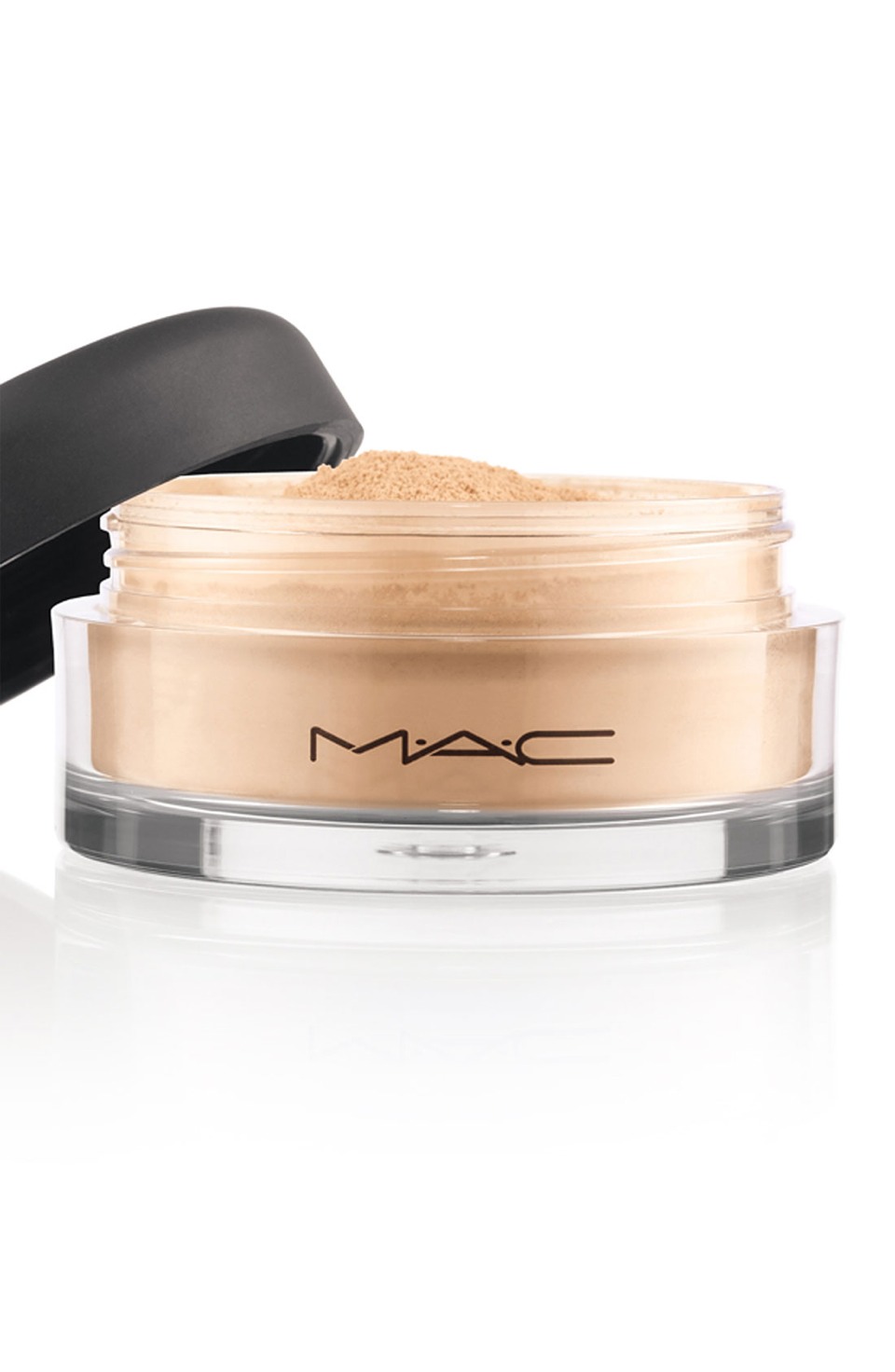 3. Dip a large, soft blusher brush into loose powder and tap off the excess powder, then dab onto greasy areas of the scalp. The powder will soak up the excess oil.