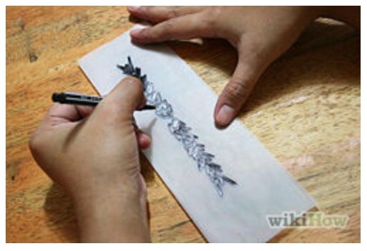 Use a dark colored gel pen and draw your design on your piece of paper  
