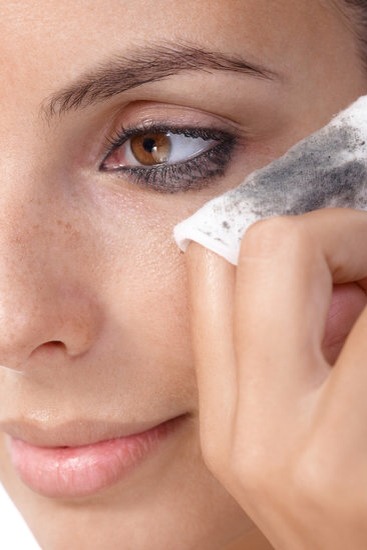 5. To remove eye makeup
Yes, coconut oil even works on waterproof mascara! Put a little on a cotton ball and gently sweep it over your eyes, paying attention to your under-eyes as well. The oil does a great job breaking down waxy, inky eye makeup, and leaves the delicate area hydrated, too.