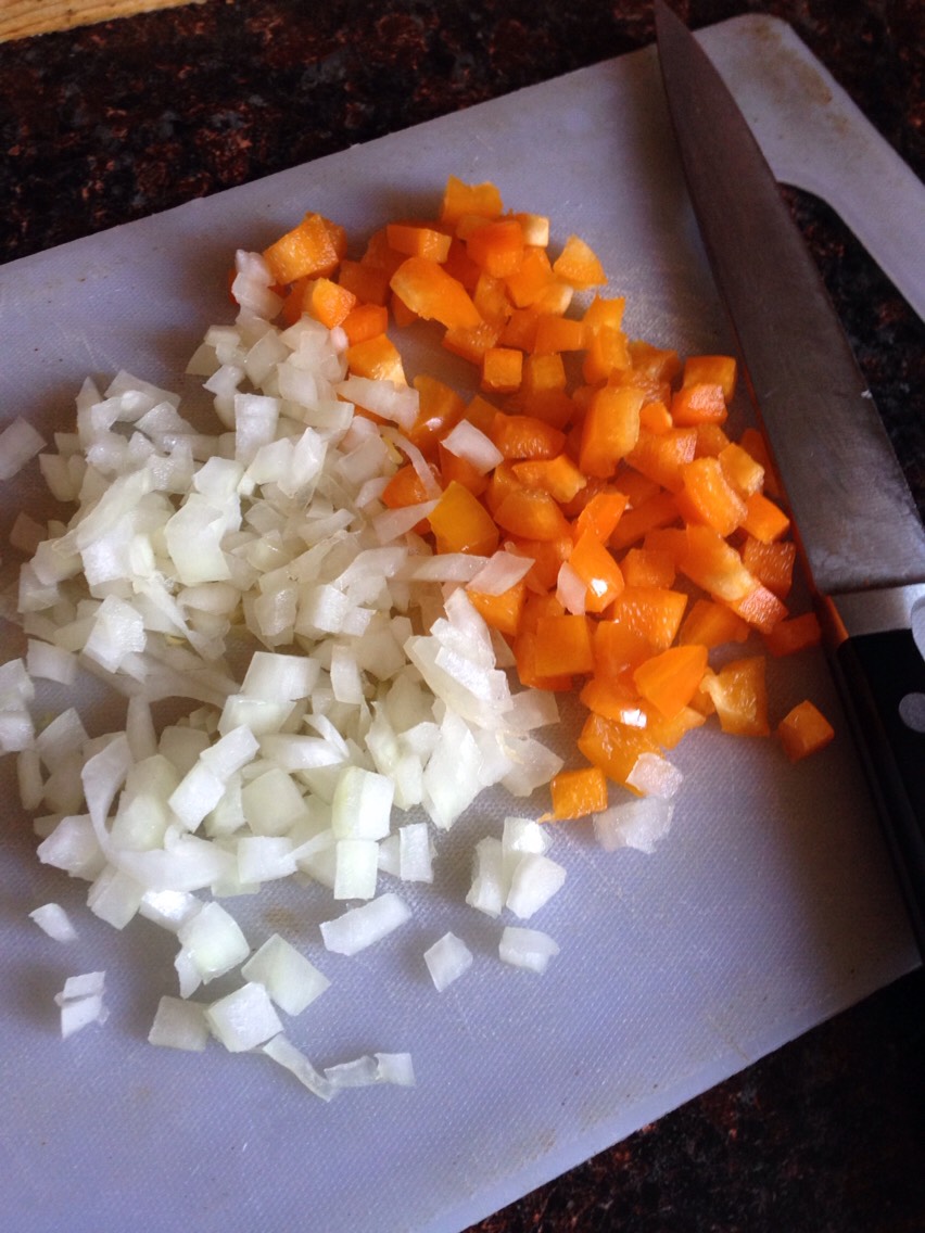 Start by dicing up some onion & bell pepper
(I chose orange since it's fall 🍂) 