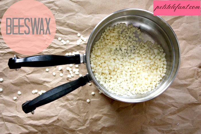 Melt beeswax in a double boiler on high until completely melted.  

