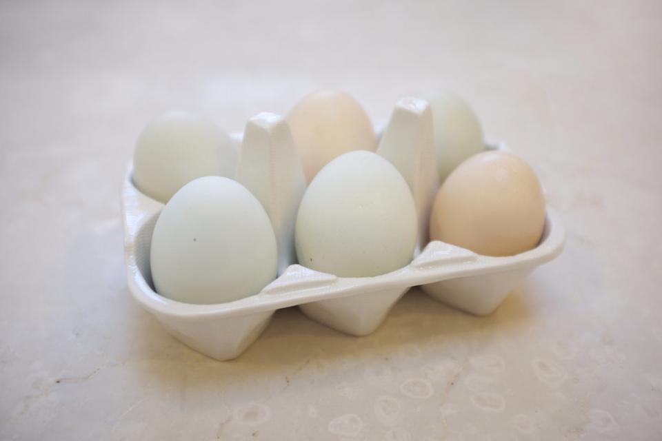 21. Eggs
Go ahead, eat the whole egg — those yolks are full of nutrients. In addition, eating eggs at breakfast (or anytime!) can add much-needed protein to your meal. The result? You feel fuller for longer.