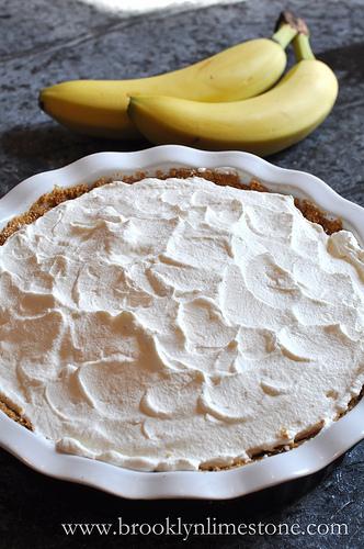 Spread whipped cream over the whole mess.