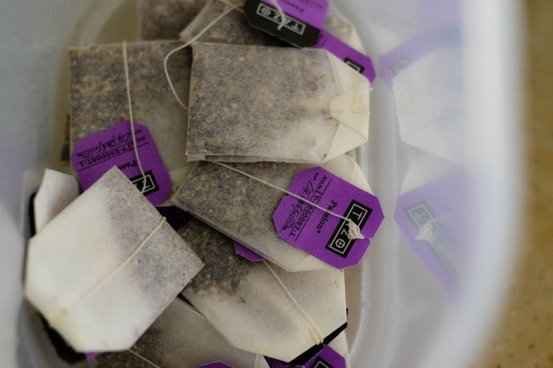 Put all 20 tea bags in a gallon pitcher. Boil 1 gallon of water in a pot.