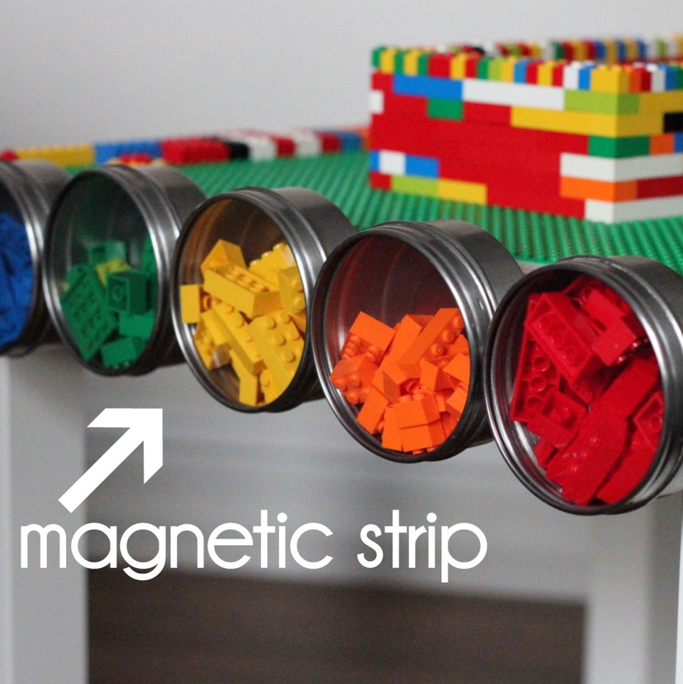 And on the other side, there’s a magnet strip, complete with magnetic tins for extra lego storage. I think these tins will eventually become ‘homes’ for all of Burke’s lego guys (providing a way for all of their ‘accessories’ to stay with them and also protection from our littlest lego aficionado).