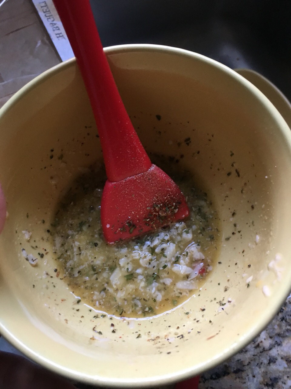 Mix some melted butter with garlic powder, Parmesan cheese, black pepper and Italian erbs 