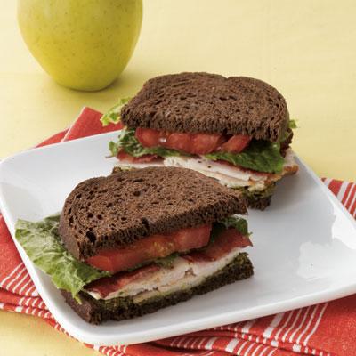 Pesto Turkey Club
Serve with an apple

Ingredients: Pesto, pumpernickel bread, slice turkey, low-sodium turkey bacon, Romaine lettuce, tomato 

Calories: 390 
