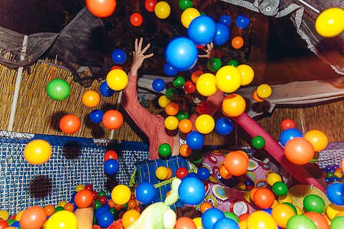 Have a ball pit!
Instead of having a height restriction, you might want to restrict the level of drunkenness.