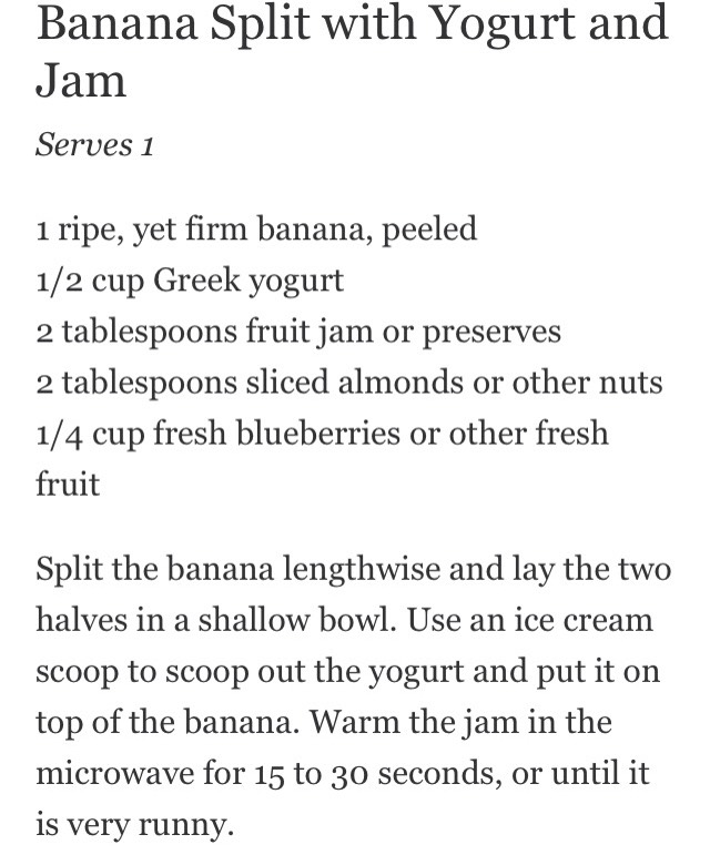 Breakfast banana split with yogurt and jam