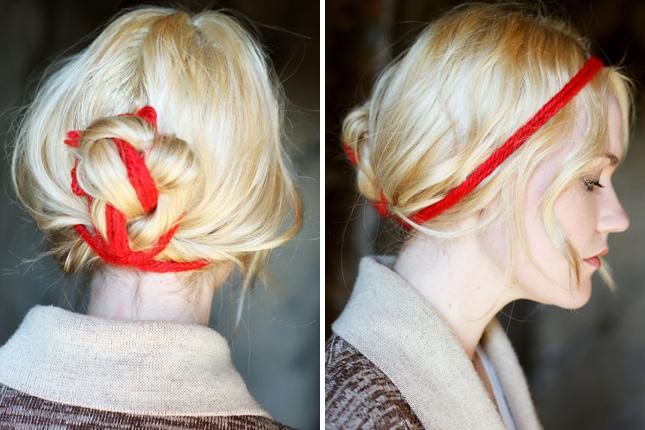 6. Yarn Messy Bun: We know yarn works wonders in the pom pom world, but never thought to incorporate it into a festive updo. This style totally works for the holiday season, adding a pop of Christmas color to a basic bun. (via A Beautiful Mess) 