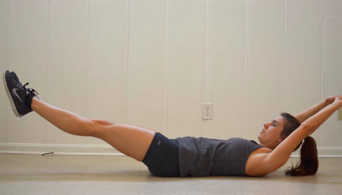 4 inch crunch- (this one is the best!) lay flat on your back with your arms above your head. simultaneously lift your arms and legs 2 inches off the floor. Try to keep your legs together 