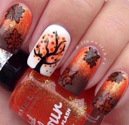 A tree done with a thick black striper, a dotting tool and glitter would be cute, as well.