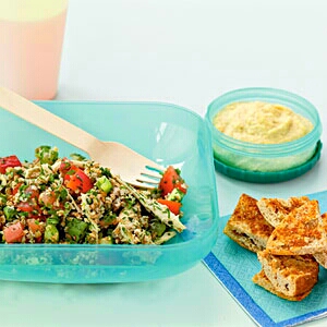 Tabbouleh with Chicken and Red Pepper
Pack with hummus and pita chips for the complete effect.
Smart Packing Tip: Salt draws moisture out of watery ingredients like cucumber and tomatoes, so pack these separately and add to the grain salad at the last minute for best results.