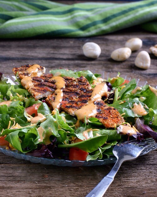 Sante Fe Chicken Salad

This salad packs some serious spice! Between the dry rub on the chicken and the dressing with cumin, paprika, and coriander, your taste buds will be thanking you.
