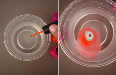 Fill a disposable, plastic container with water. Open all the nail polish bottles and start dripping polish into the water, one color at a time.