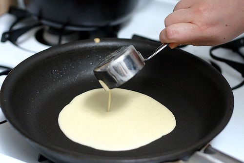 For each crepe pour about 1/4 cup of the batter into the frying pan and swirl it around quickly 
