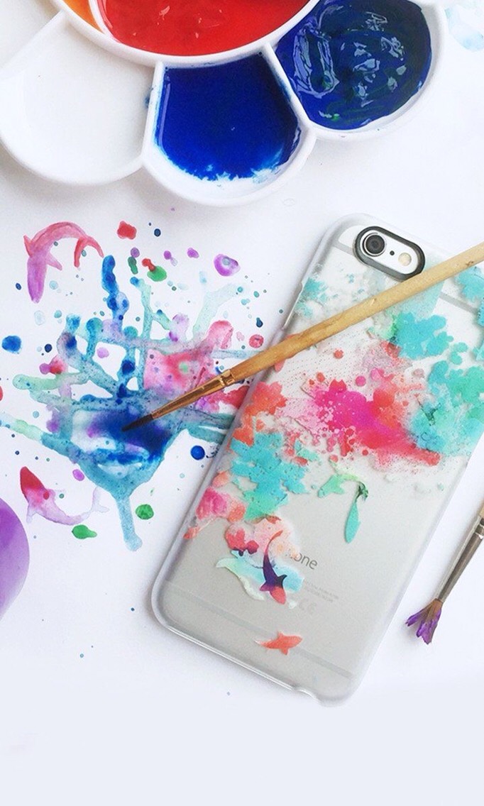 Get a clear phone case and decorate it with paint. So simple yet so pretty! 