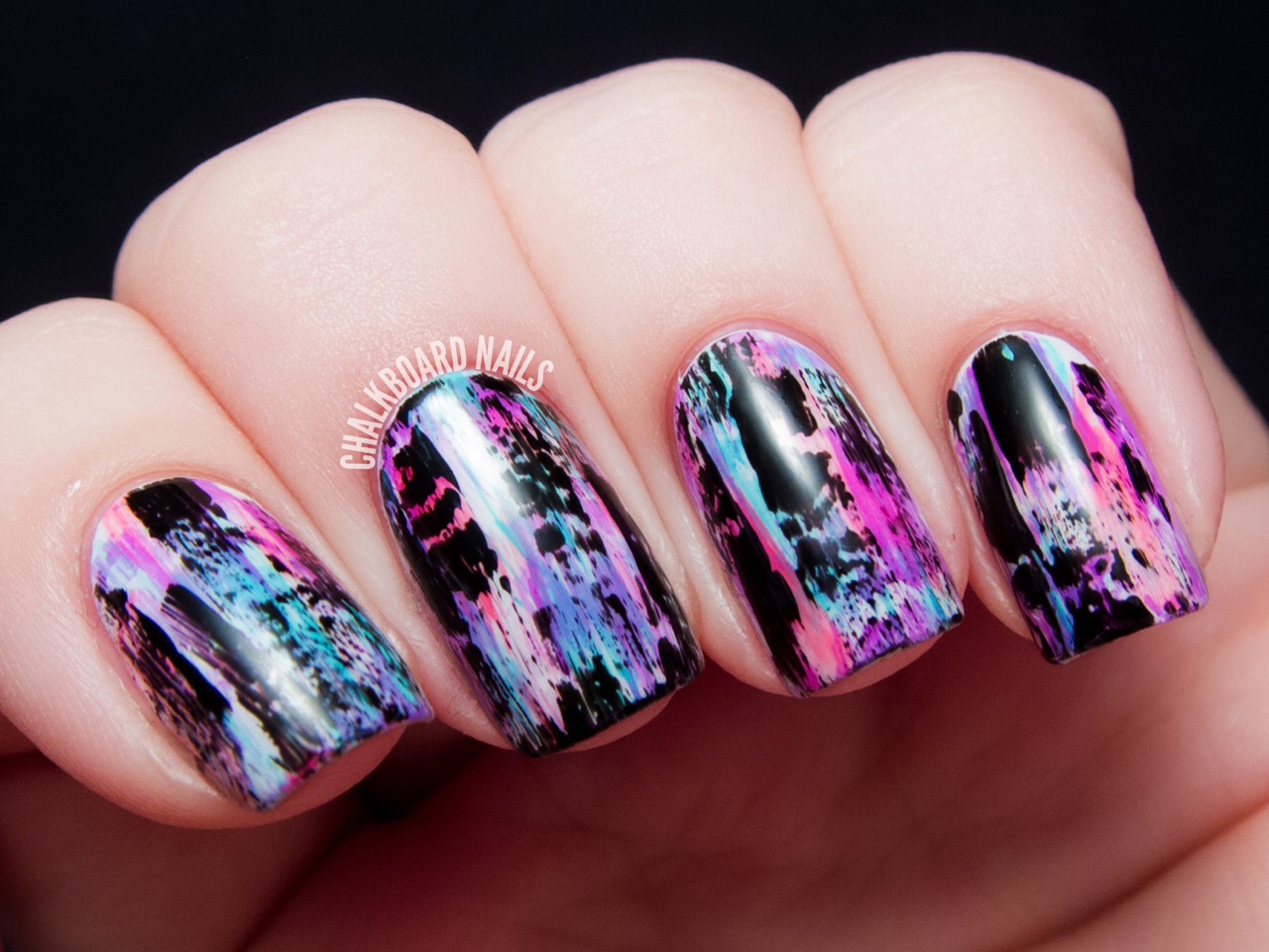 Amazing paint splattered textured nails! If you have experience in nail art - or want to have some fun trying this out it is perfect for you! All you need is a colored basecoat (color of your choice) and a straw dipped in nail polish to create a fantastic, abstract and textured effect!