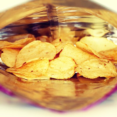 1. Count Your Chips (and crackers)
You can't eat your chips from a big bag because it's way too tempting to eat until the bag is empty. Stick to one serving, that's about 15 chips, and save yourself 1,120 calories.