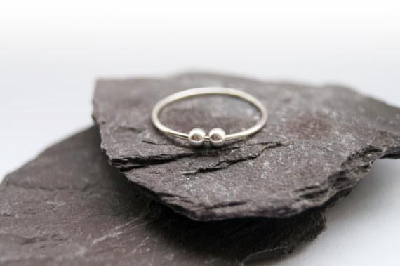 This lovely little worry ring.More subtle than a stress ball. By Curious Owl Shop