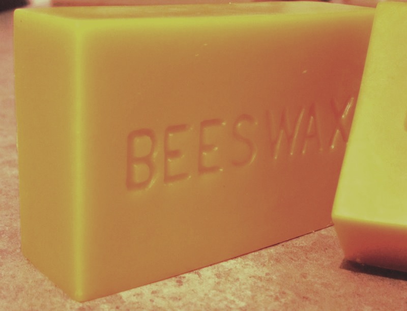 Beeswax or no beeswax
•
Beeswax is the main ingredient in making your own lip balm, but without it, you'll be fine. 
•
The beeswax way - add a teaspoon of beeswax, a table spoon of honey, and coconut oil, if you have some. For flavor, add kool-aid packets or flavored water packets (powder)