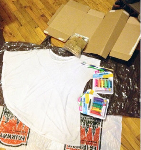 To prevent the paint from seeping from the front of the shirt, through to the back; create a cardboard insert. 
Because you're painting with a sponge, you need less paint spread over a larger surface area. Put a small amount of paint on wax paper & fold the wax paper to smooth it. 