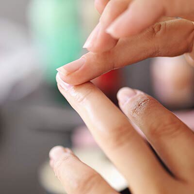 Cuticle softener: Using your finger, swipe a small amount of the oil onto each of your cuticles and allow it to sink in.