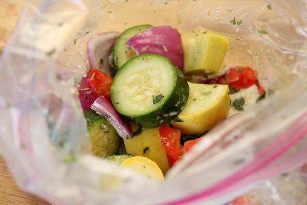 Just put a small spoonful of the herb mixture in with a bag of veggies and then drizzle a little more olive oil in there.