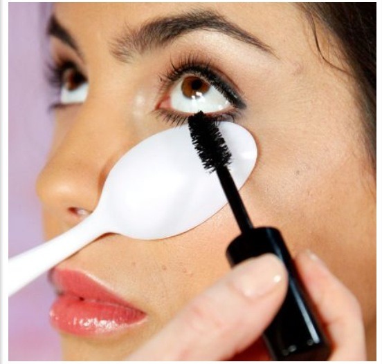 Use a plastic spoon on your bottom eyelashes as it prevents you getting mascara on your skin & gives you a thicker coat.