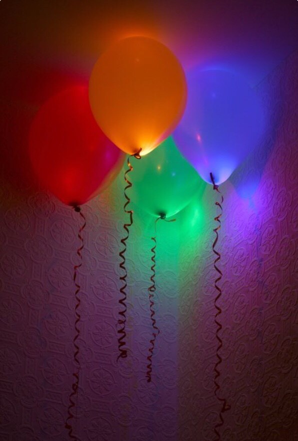 Put a glow stick inside a balloon