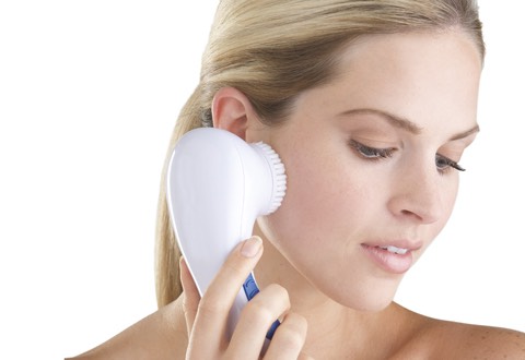 Cleanse your face using a cleanser and face brush. 