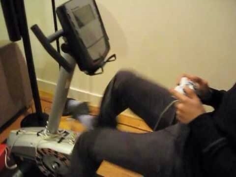 Play video games while you're on the exercise bike. 
As gameplay gets more intense, you'll find yourself pedaling faster. Please tap for full view.

