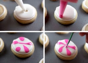 Use the squeeze bottle to fill the center of the outlined cookie with white flood icing. 