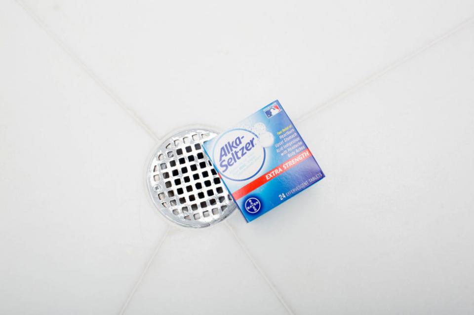13. Clogged drains? Drop four Alka-Seltzer tablets down the drain followed by a cup of white vinegar to unclog your shower. Wait about 10 minutes and then rinse with hot water.