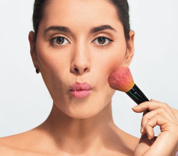 To Apply Blush
Use the Diva
Suck in your cheeks and apply color to your cheekbones, working from the temples in. Just follow the lines of your bones—it’s foolproof. After applying, look straight into the mirror to make sure that you’ve put the same amount of color on each side