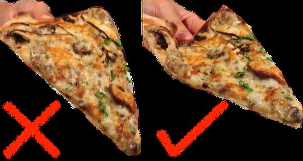 A pizza should always be held by folding it a little to make a U-shape so as to prevent it from flopping over.