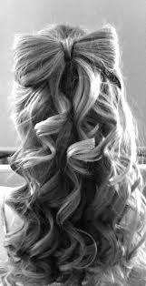 a cute bow hairstyle for your hair go to www.beautylish.com for tutorial