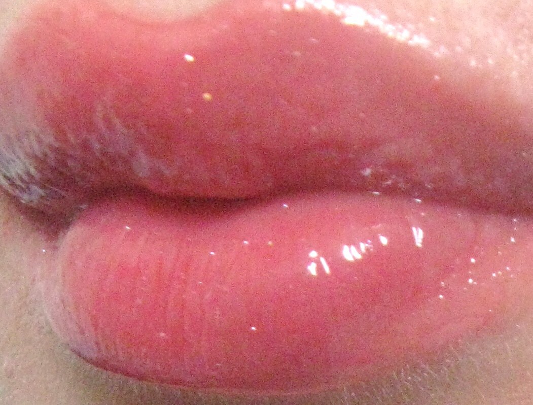 DIY Lip Plumper Mixing Cinnamon Oil Extract To A Clear Bottle Of Lip Gloss 